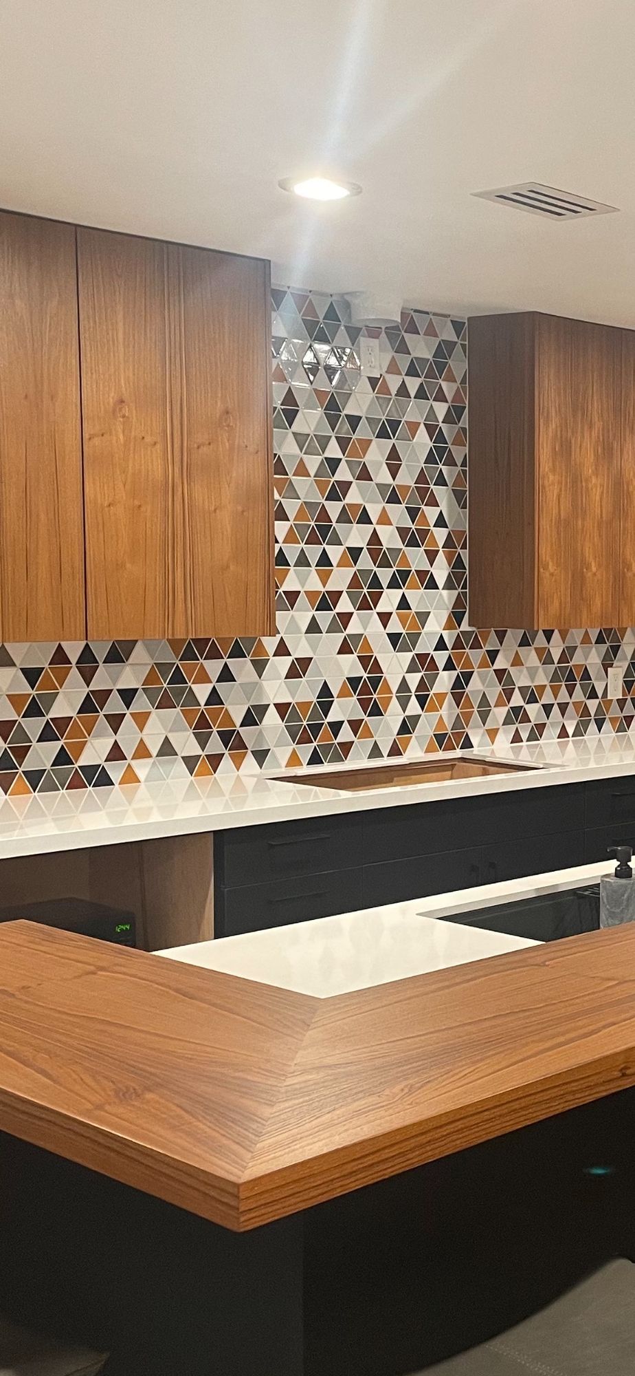 Multicolor triangle mosaic kitchen backsplash